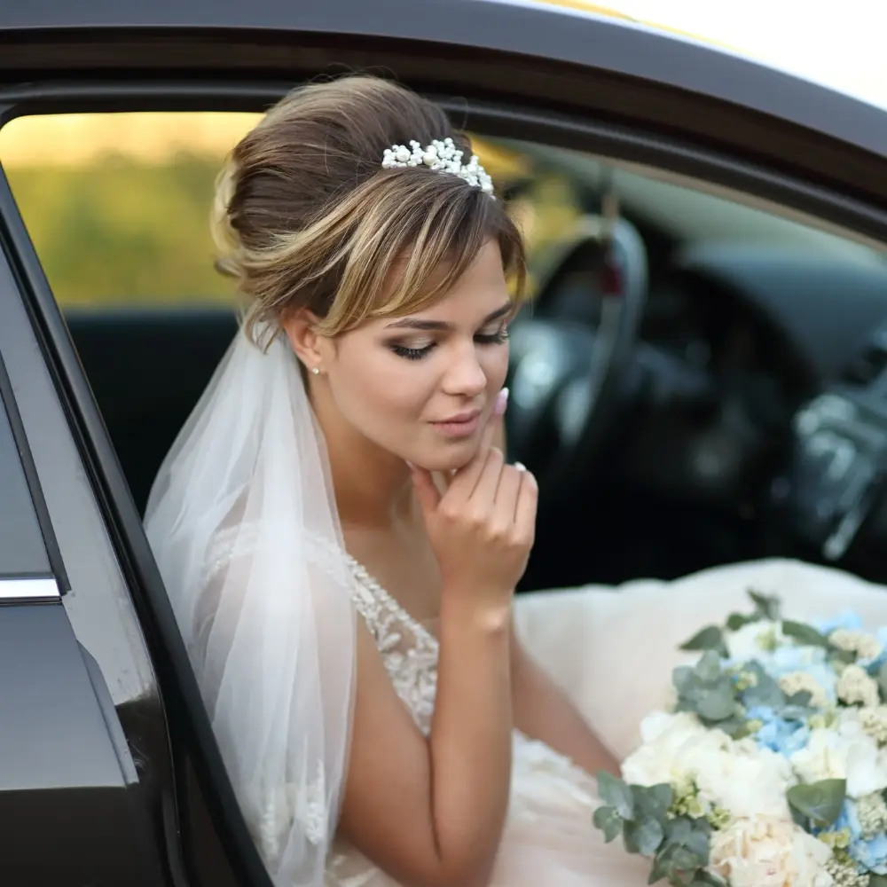 Executive Tours chauffeur opening a car door for a client